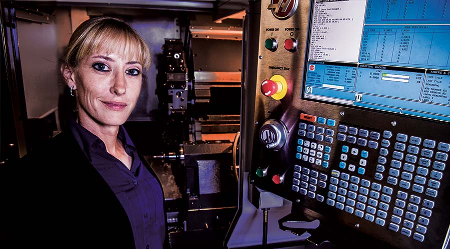 Heather Mann uses computer programs to operate lathes, mill, routers and grinders.