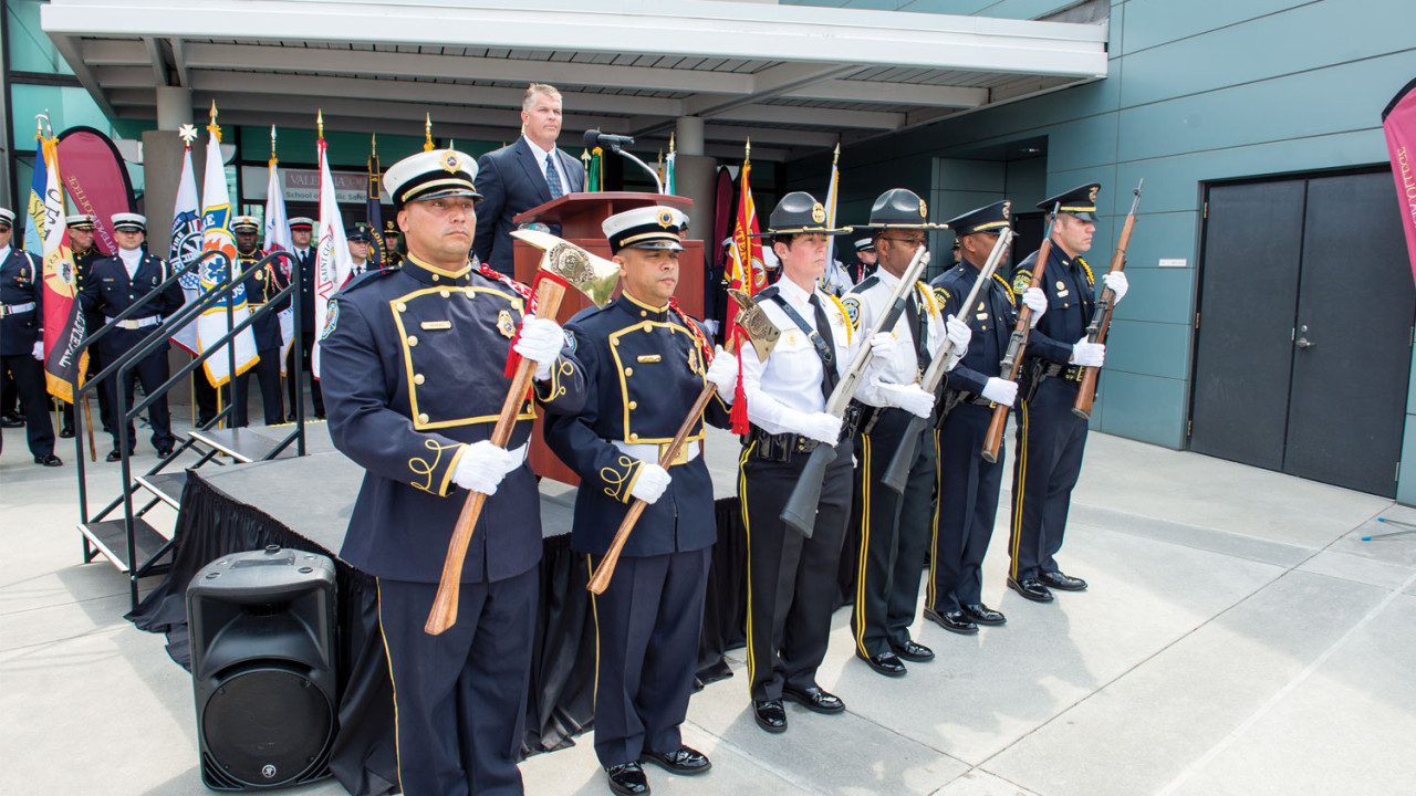 Standing at attention were all branches of public service for the unveiling of the School of Public Safety in April.