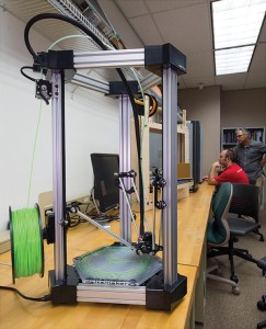 An open-air 3-D printer provides full view of the printing process. 