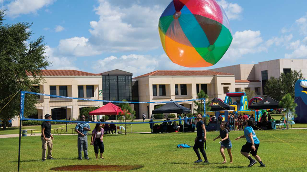 Osceola Campus students play volleyball­—with one of the largest balls we’ve seen—on spirit day.