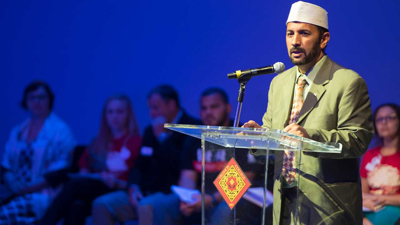 Imam Muhammad Musri, president of the Islamic Society of Central Florida, spoke at the East Campus memorial service.