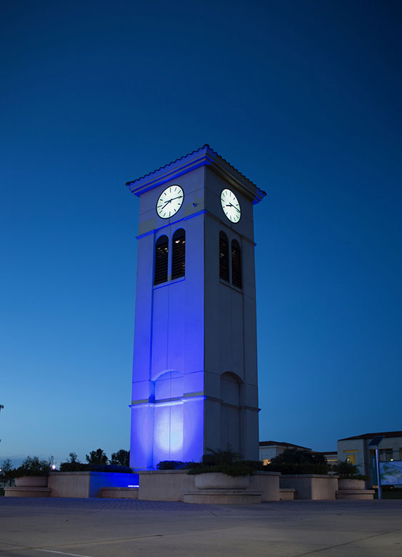 The Osceola Campus lights the clock tower blue to honor Kissimmee Police officers Sam Howard and Matthew Baxter, who were killed in the line of duty on Aug. 18.