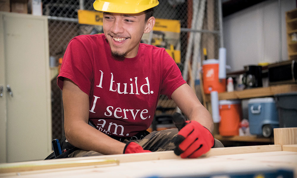 John Moreno is putting his newly-learned construction skills to work.