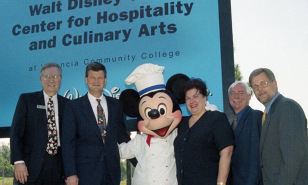 Mickey Mouse and Walt Disney World President and Valencia grad Al Weiss